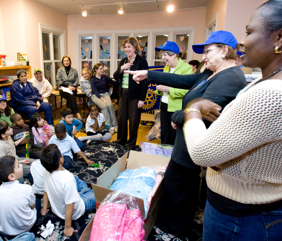 Rotary Service Volunteers with Children